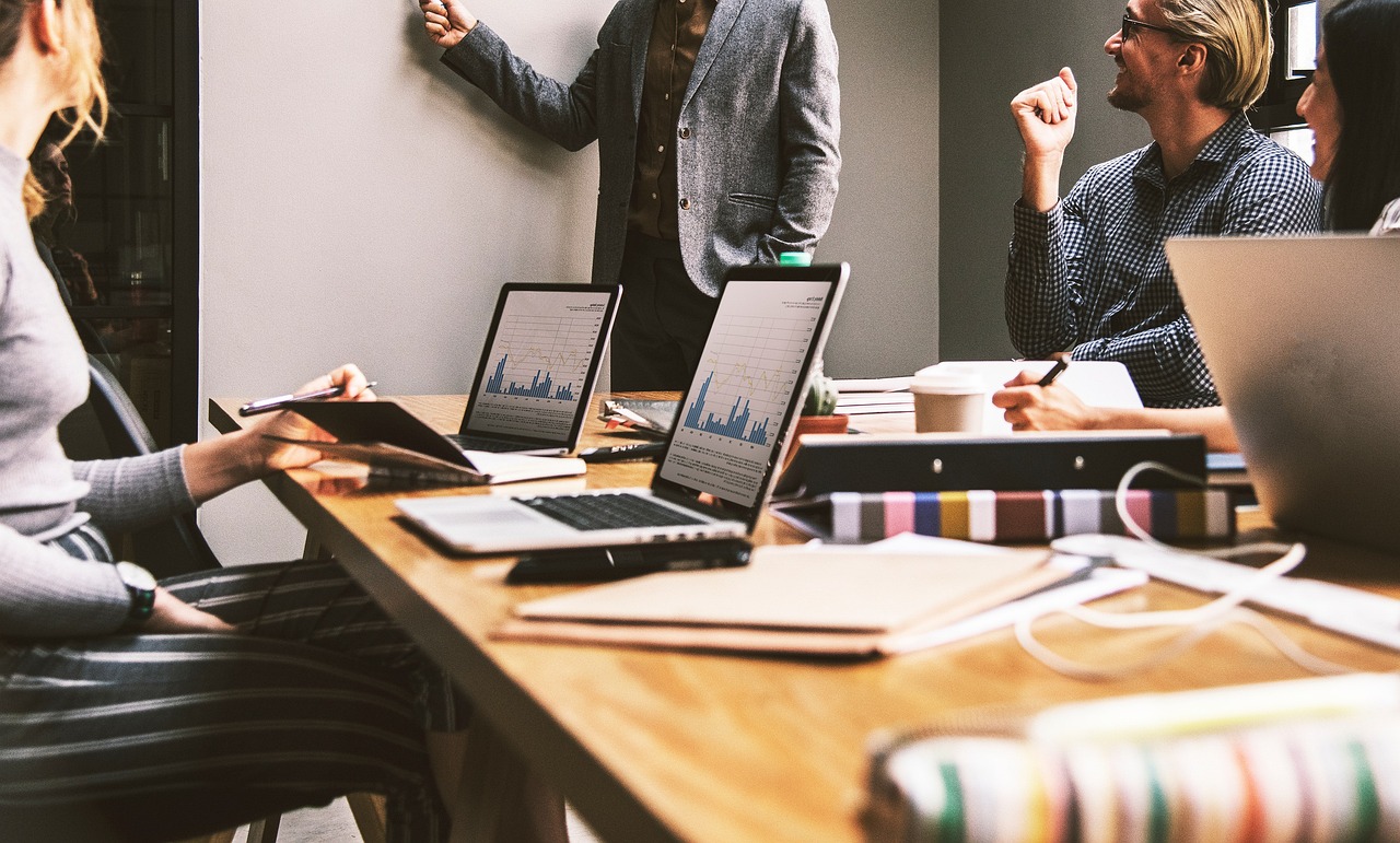 Business analysts evaluating digital asset transactions
